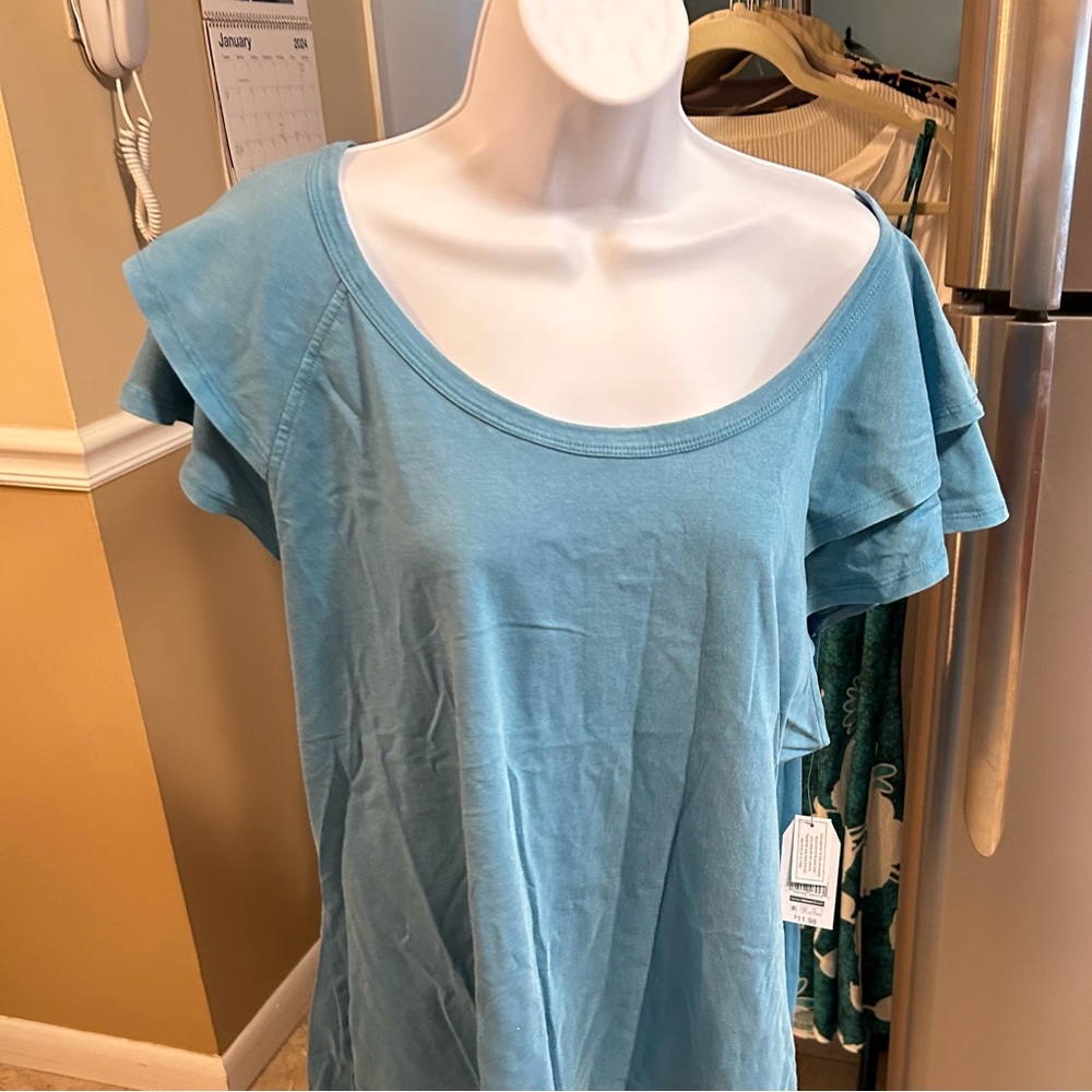 Aqua blue women’s shirt.